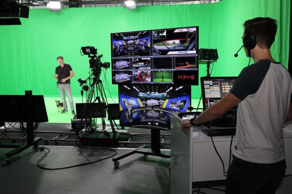 Green screen studio with a camera on track and vision control